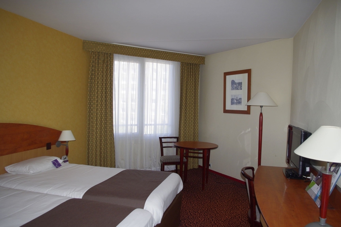 Imagen de la habitación del Hotel Mercure Saint Etienne Parc de l'Europe. Foto 12