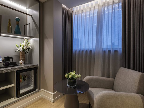 Imagen de la habitación del Hotel Mercure Shanghai Global Harbour. Foto 8