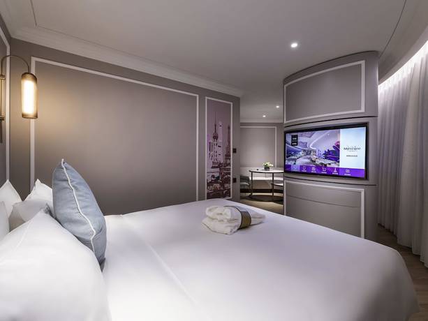 Imagen de la habitación del Hotel Mercure Shanghai Global Harbour. Foto 11