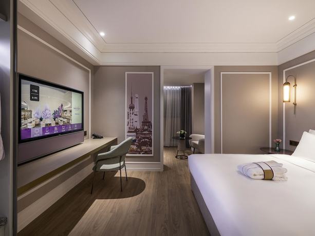 Imagen de la habitación del Hotel Mercure Shanghai Global Harbour. Foto 18