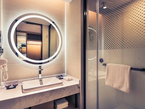 Imagen de la habitación del Hotel Mercure Shanghai Hongqiao Railway Station. Foto 19