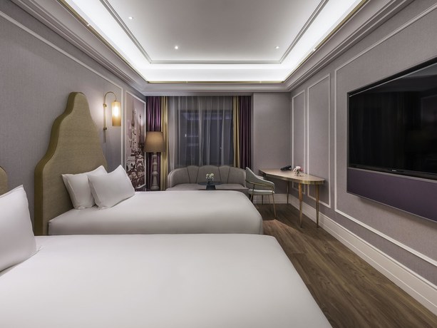 Imagen de la habitación del Hotel Mercure Shanghai Jiuting. Foto 8