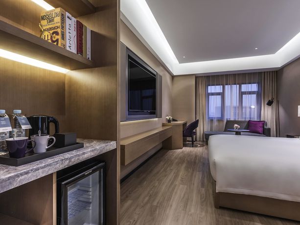 Imagen de la habitación del Hotel Mercure Shanghai Jiuting. Foto 9