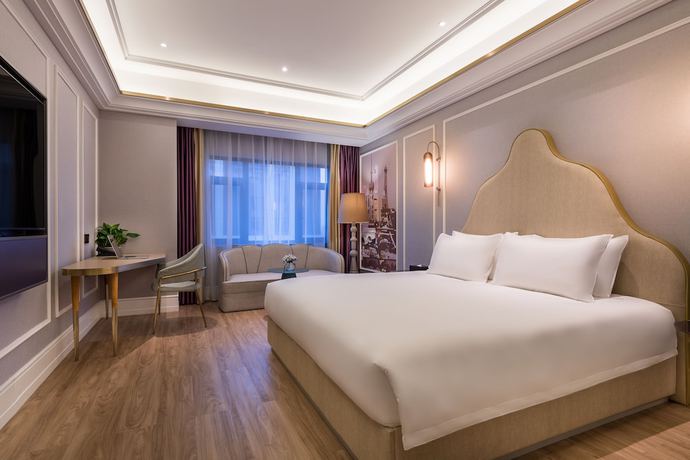 Imagen de la habitación del Hotel Mercure Shanghai Jiuting. Foto 11