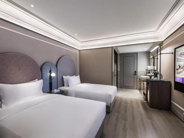 Imagen de la habitación del Hotel Mercure Shanghai Qiantan. Foto 4
