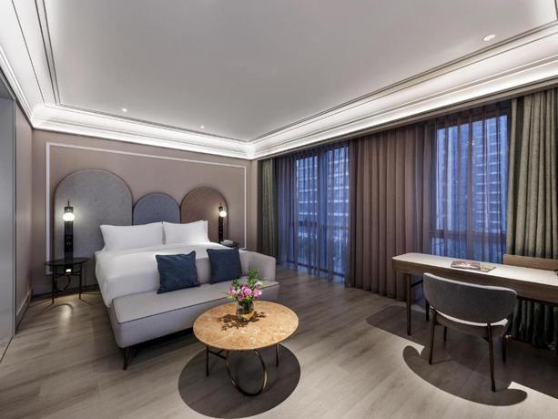 Imagen de la habitación del Hotel Mercure Shanghai Qiantan. Foto 8