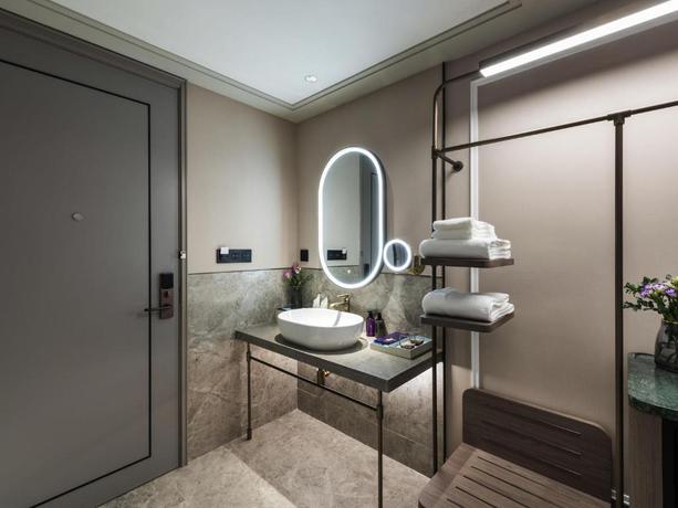 Imagen de la habitación del Hotel Mercure Shanghai Qiantan. Foto 9