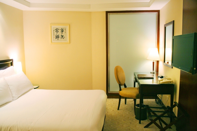 Imagen de la habitación del Hotel Mercure Shanghai Royalton. Foto 15