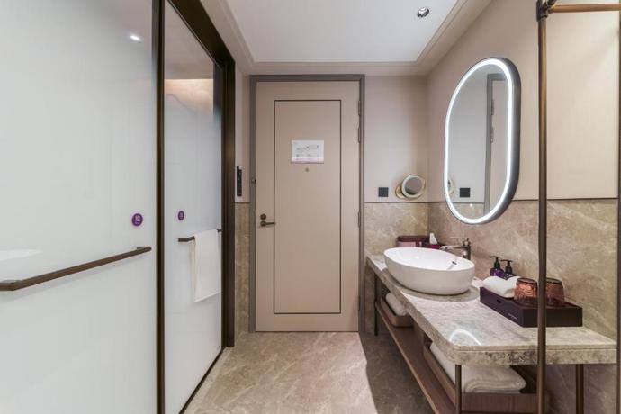 Imagen de la habitación del Hotel Mercure Shanghai Xuhui Caohejing. Foto 6