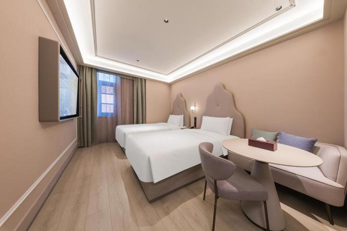 Imagen de la habitación del Hotel Mercure Shanghai Xuhui Caohejing. Foto 7
