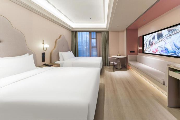 Imagen de la habitación del Hotel Mercure Shanghai Xuhui Caohejing. Foto 10