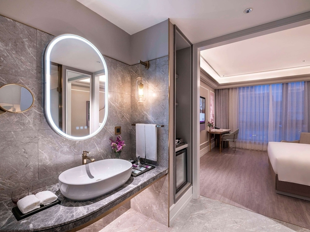 Imagen de la habitación del Hotel Mercure Shanghai Xujiahui South. Foto 8