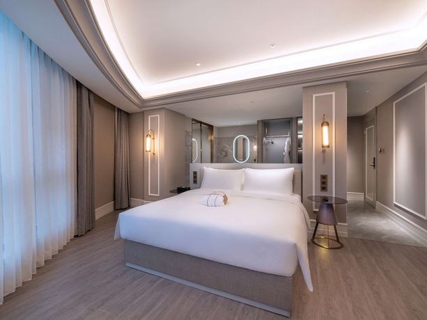 Imagen de la habitación del Hotel Mercure Shanghai Xujiahui South. Foto 11
