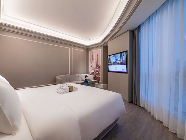 Imagen de la habitación del Hotel Mercure Shanghai Xujiahui South. Foto 12