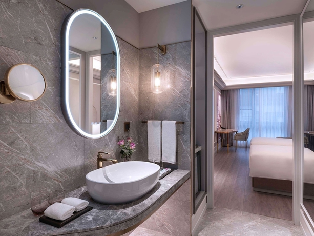 Imagen de la habitación del Hotel Mercure Shanghai Xujiahui South. Foto 14
