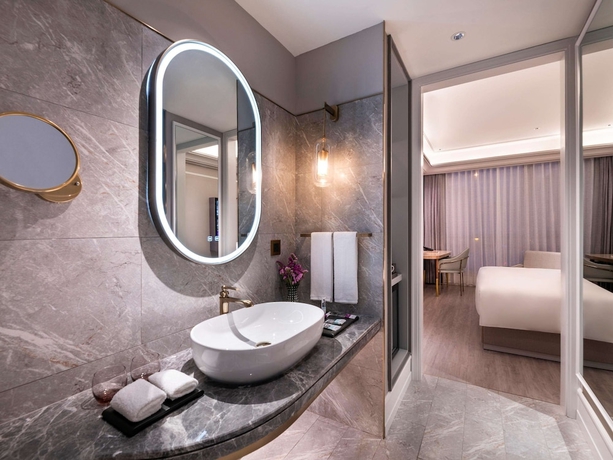 Imagen de la habitación del Hotel Mercure Shanghai Xujiahui South. Foto 17