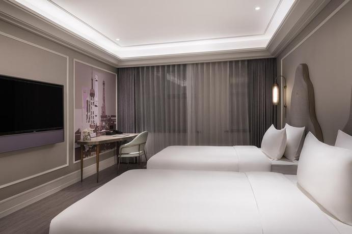 Imagen de la habitación del Hotel Mercure Shanghai Yu Garden On The Bund. Foto 5
