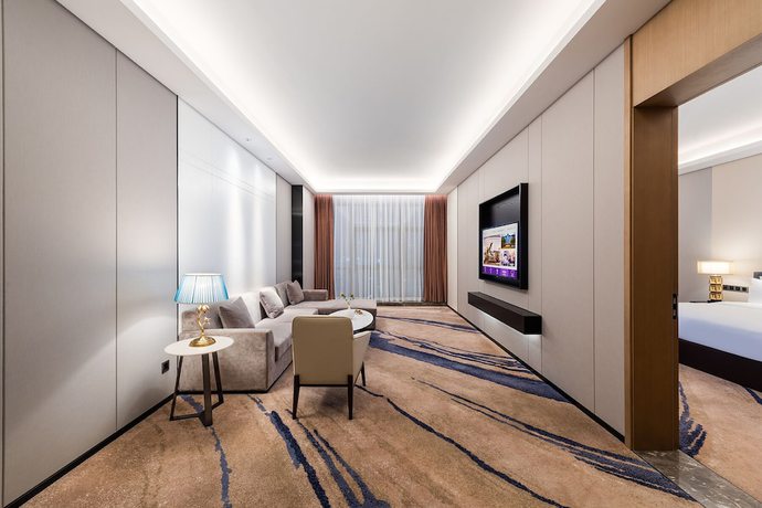 Imagen de la habitación del Hotel Mercure Shenzhen Pinghu. Foto 13