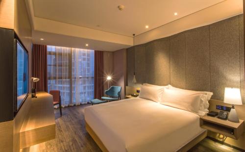 Imagen de la habitación del Hotel Mercure Suzhou Downtown. Foto 4