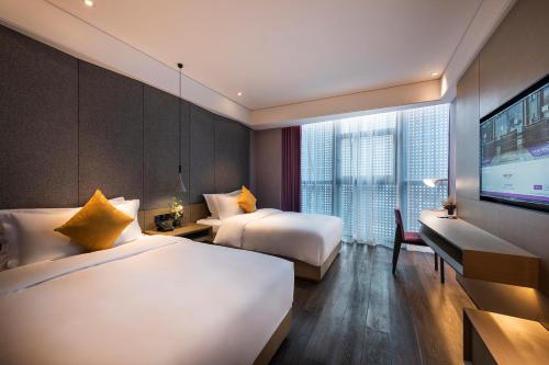 Imagen de la habitación del Hotel Mercure Suzhou Downtown. Foto 7
