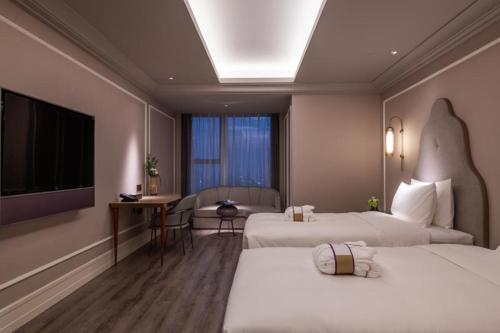 Imagen de la habitación del Hotel Mercure Suzhou Jinji Lake. Foto 11