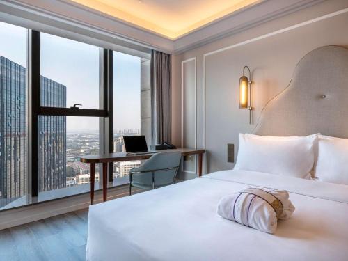 Imagen de la habitación del Hotel Mercure Suzhou Jinji Lake. Foto 12