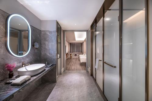 Imagen de la habitación del Hotel Mercure Suzhou Jinji Lake. Foto 13