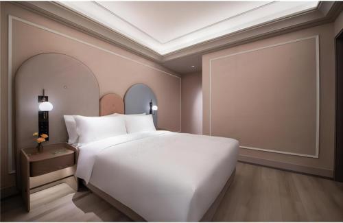 Imagen de la habitación del Hotel Mercure Suzhou Shilu Shantang. Foto 6