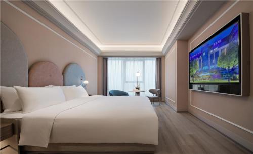 Imagen de la habitación del Hotel Mercure Suzhou Shilu Shantang. Foto 8