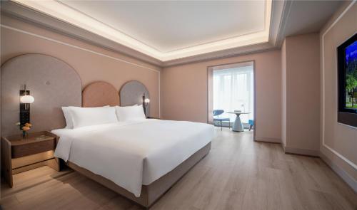 Imagen de la habitación del Hotel Mercure Suzhou Shilu Shantang. Foto 9