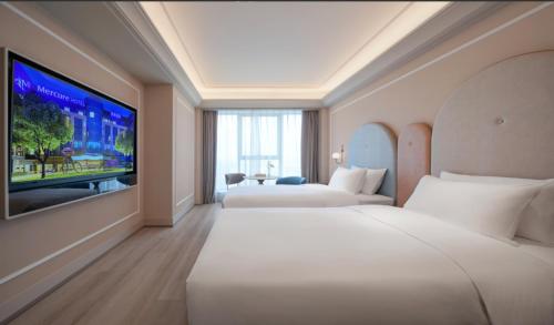Imagen de la habitación del Hotel Mercure Suzhou Shilu Shantang. Foto 10