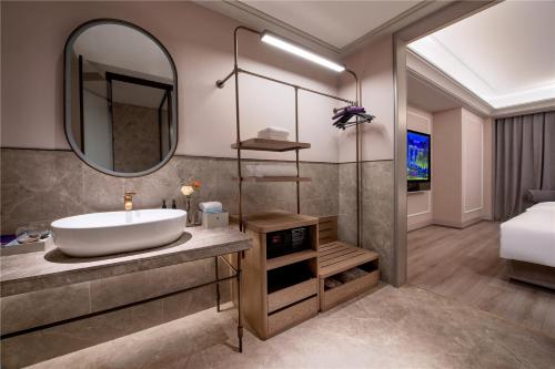 Imagen de la habitación del Hotel Mercure Suzhou Shilu Shantang. Foto 11
