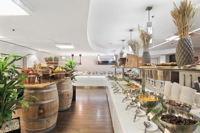 Imagen del bar/restaurante del Hotel Mercure Sydney. Foto 2