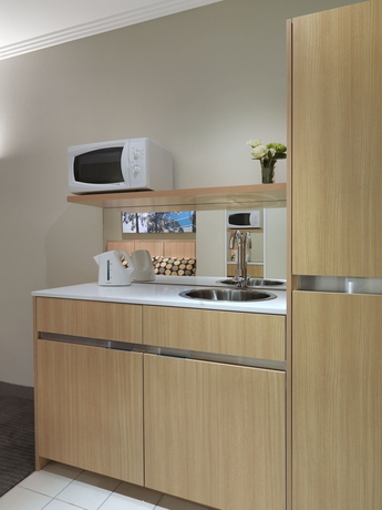 Imagen de la habitación del Hotel Mercure Sydney Macquarie Park. Foto 11