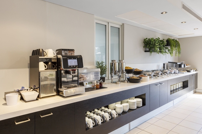 Imagen del bar/restaurante del Hotel Mercure Sydney Macquarie Park. Foto 8