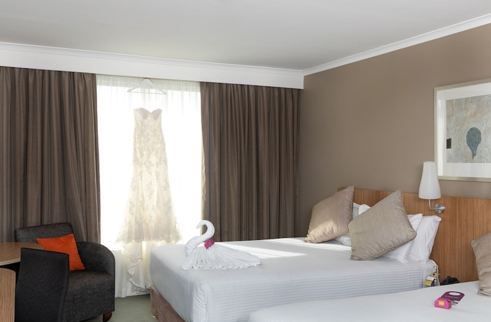 Imagen de la habitación del Hotel Mercure Sydney Parramatta. Foto 9