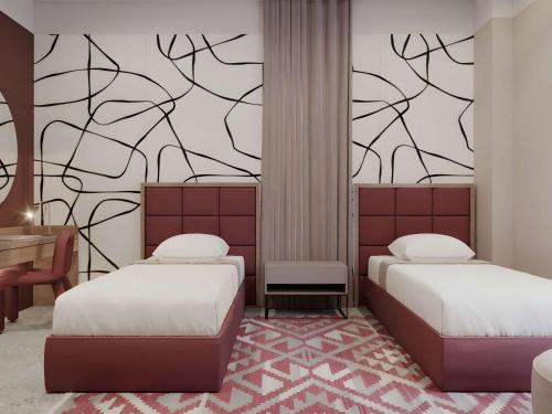 Imagen de la habitación del Hotel Mercure Tirana. Foto 20