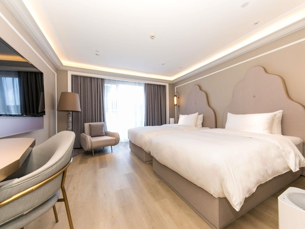 Imagen de la habitación del Hotel Mercure Turpan Downtown. Foto 6