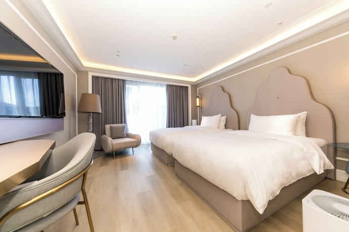 Imagen de la habitación del Hotel Mercure Turpan Downtown. Foto 8