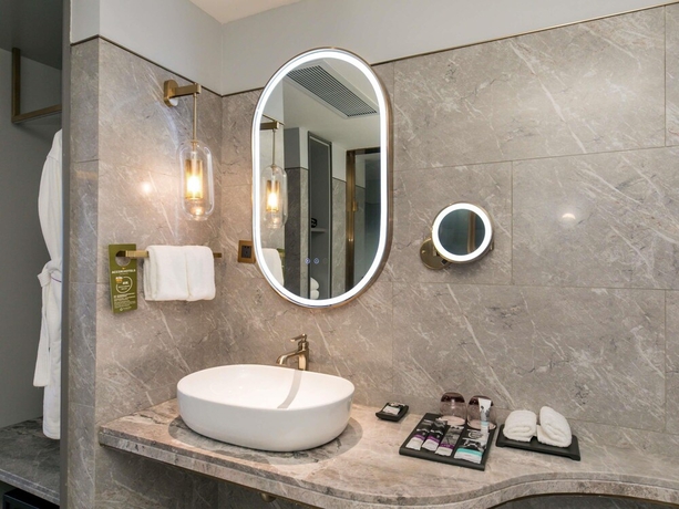 Imagen de la habitación del Hotel Mercure Turpan Downtown. Foto 12