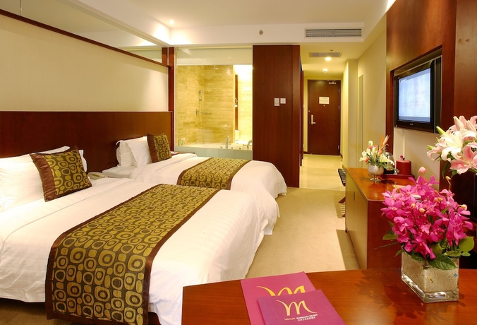 Imagen de la habitación del Hotel Mercure Wanshang Beijing. Foto 9