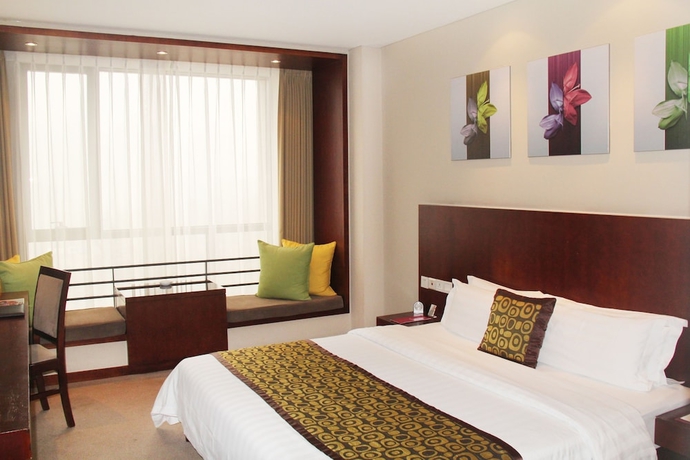 Imagen de la habitación del Hotel Mercure Wanshang Beijing. Foto 12