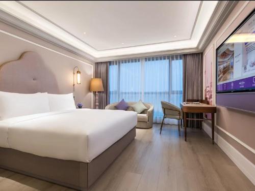 Imagen de la habitación del Hotel Mercure Wuxi Taihu Scenic Area Jiangnan University. Foto 7