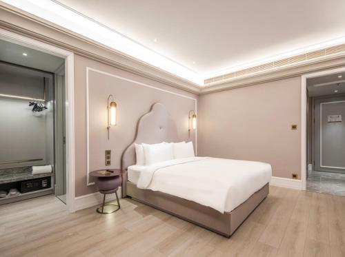 Imagen general del Hotel Mercure Wuxi Taihu Scenic Area Jiangnan University. Foto 3