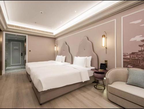 Imagen de la habitación del Hotel Mercure Wuxi Taihu Scenic Area Jiangnan University. Foto 10