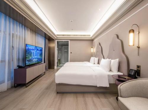 Imagen de la habitación del Hotel Mercure Wuxi Taihu Scenic Area Jiangnan University. Foto 11