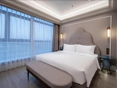 Imagen general del Hotel Mercure Wuxi Taihu Scenic Area Jiangnan University. Foto 4