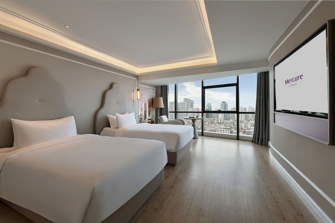 Imagen de la habitación del Hotel Mercure Xiamen On The Bund. Foto 8