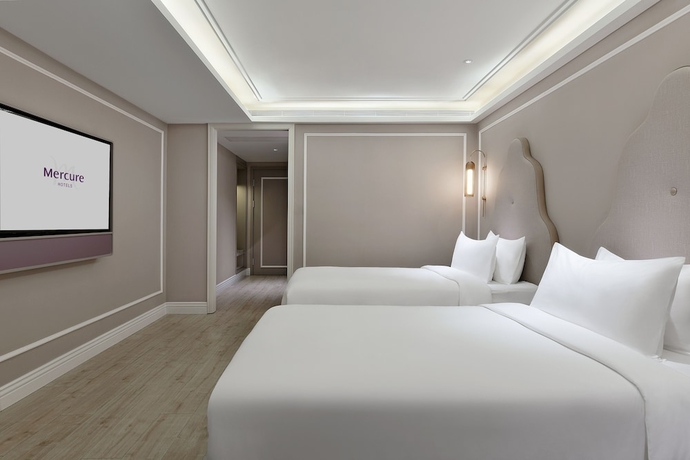 Imagen de la habitación del Hotel Mercure Xiamen On The Bund. Foto 9