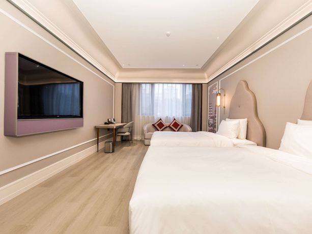 Imagen de la habitación del Hotel Mercure Xian Dayan Pagoda. Foto 2
